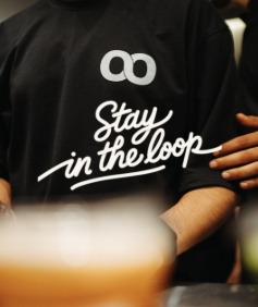A Loop team member in a 'Stay in the loop' shirt